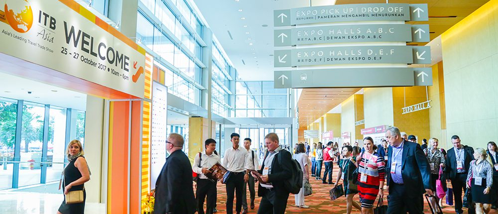 People walking into ITB Asia conference
