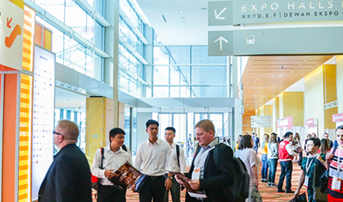 People walking into the ITB Asia conference